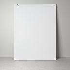 Grip front for IKEA furniture in white lacquer, leaning against a wall, milled handle pocket at the top edge