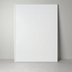 Linea front for IKEA furniture in white lacquer, a flat front with a frame along the edge, leaning against a wall