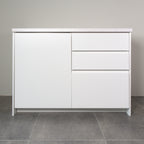 Kitchen cabinet with Milled Handle fronts in white lacquer, a door and three drawers, front view