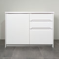 Kitchen cabinet with Grip fronts in white lacquer, a door and three drawers with handle pockets, front view