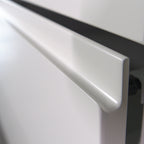 Open drawer with a Milled Handle front, profile of the handle undercut in the top edge