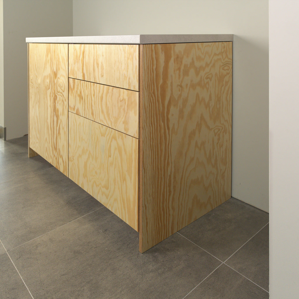 Cabinet with pine plywood fronts and side panel, angled view from the right