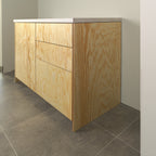Cabinet with pine plywood fronts and side panel, angled view from the right