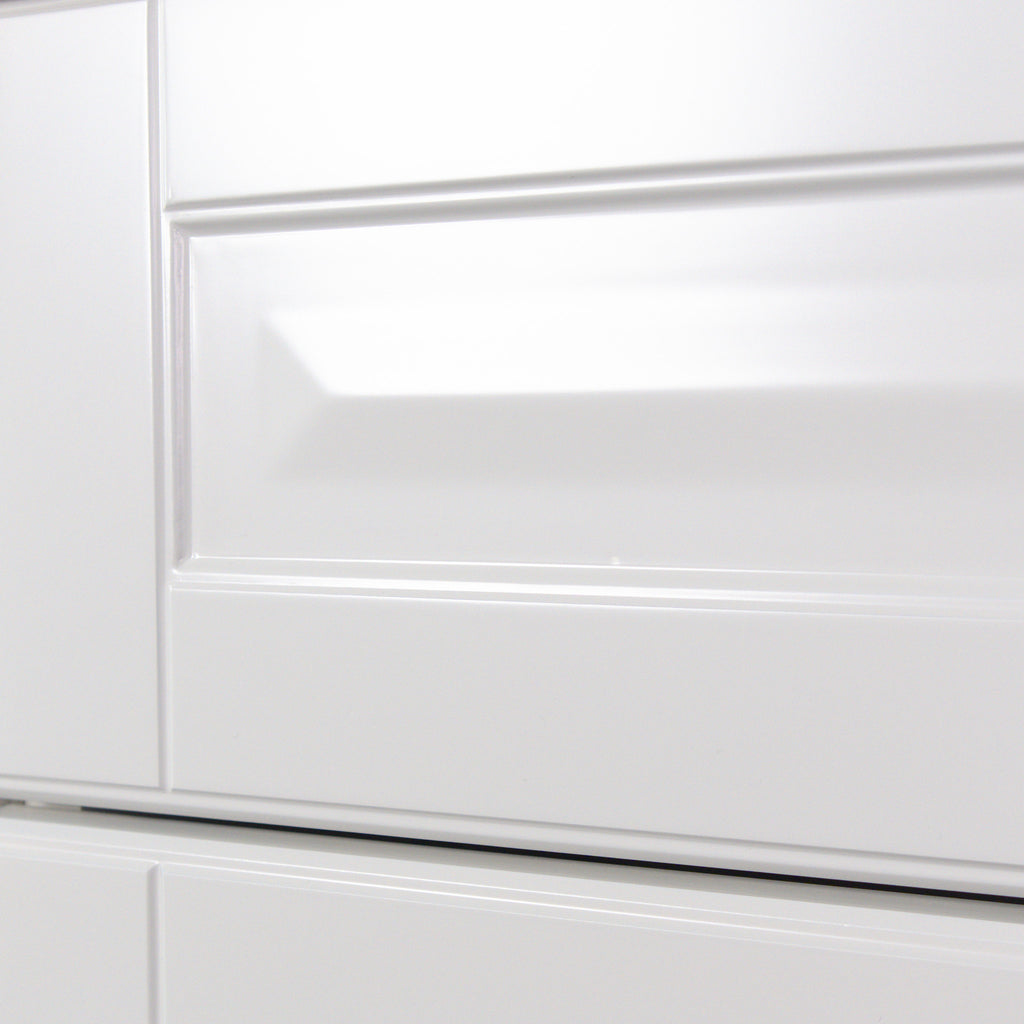 Bevelled raised panel of the Vienna front in side light, white lacquer, close-up