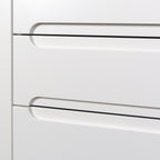Handle pocket with a rounded end at the top edge of a drawer, Grip front in white lacquer close up
