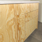 Grain of pine plywood cabinet fronts, close-up