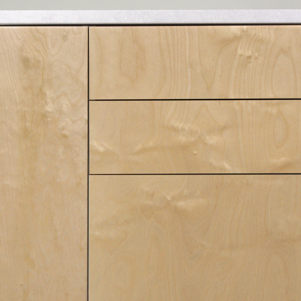 Gaps between drawers with birch plywood fronts, detail