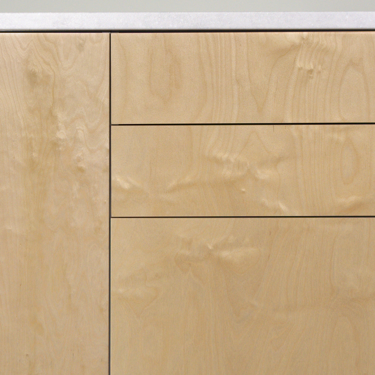 Gaps between drawers with birch plywood fronts, detail