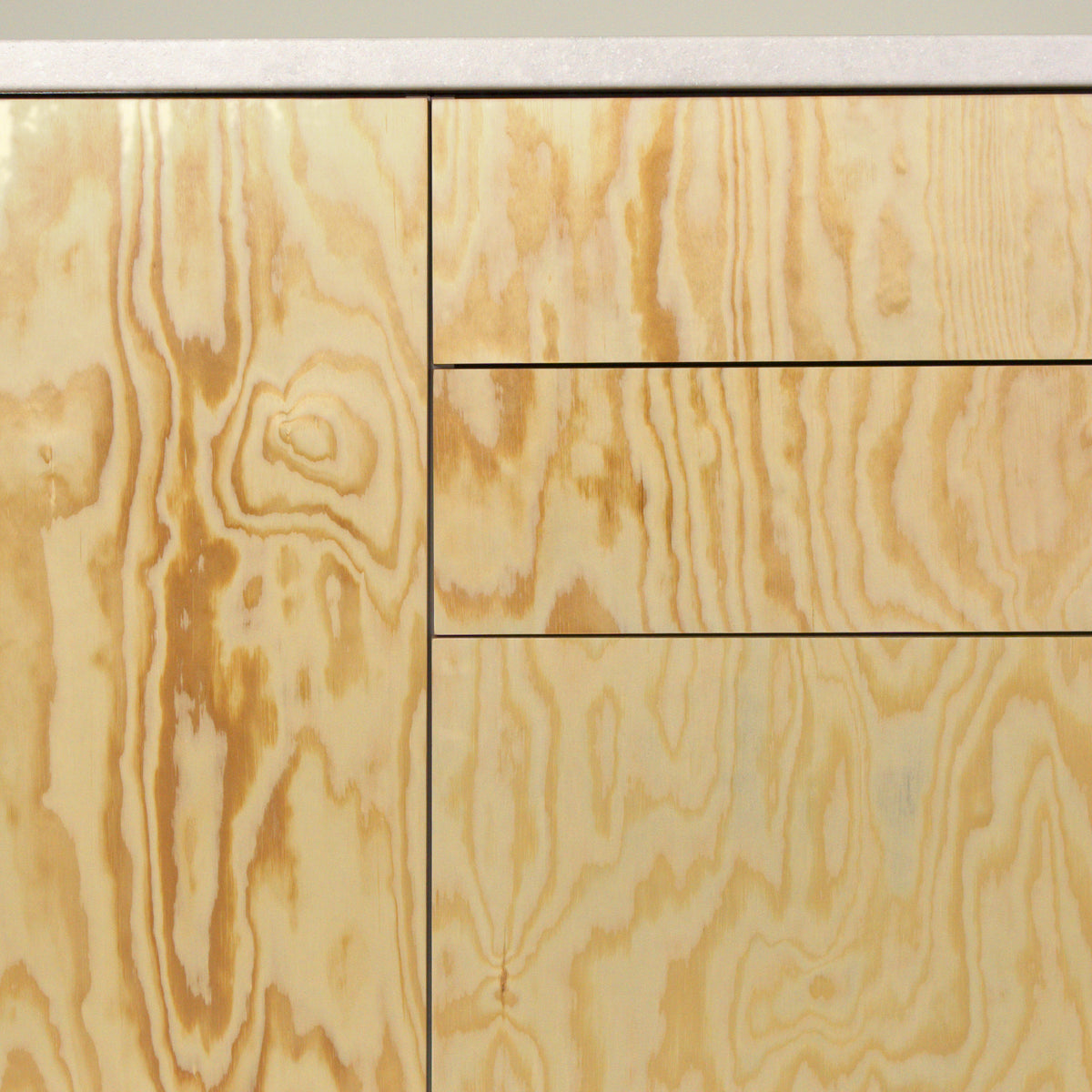 Gaps between drawers with pine plywood fronts, detail
