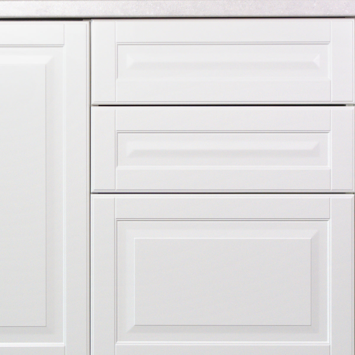 Drawers with Vienna fronts close-up, even gaps between the fronts, white lacquer