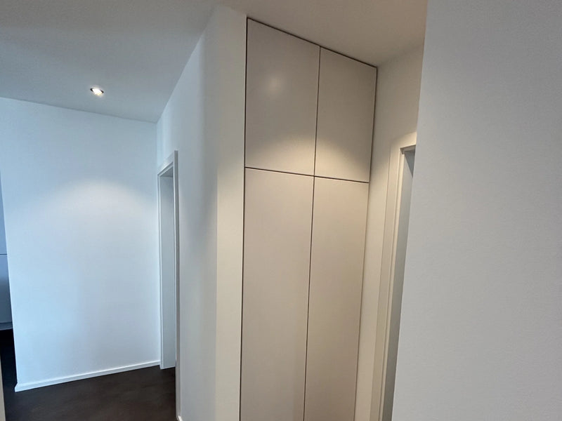 Hallway alcove wardrobe on IKEA PLATSA with Smooth fronts in Farrow & Ball Great White - project in Germany